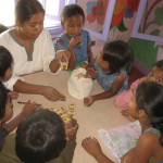 Children participating in activities at House with Heart’s Children’s Learning Center